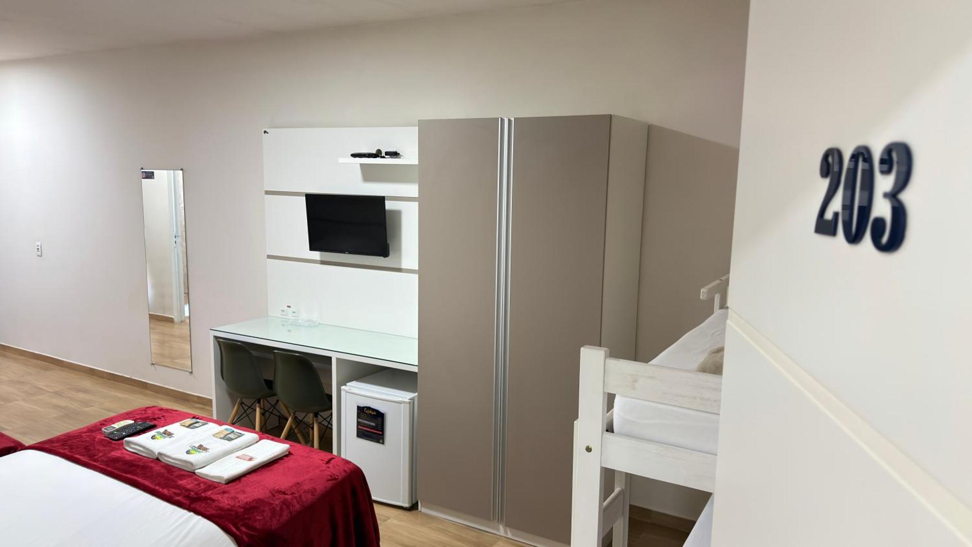 Quarto Família com Varanda